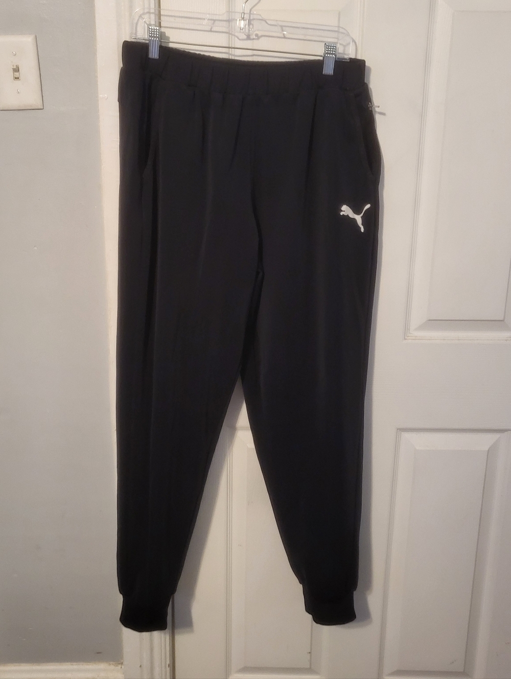 Puma Essentials  Black Jogger Pants with White Puma Logo